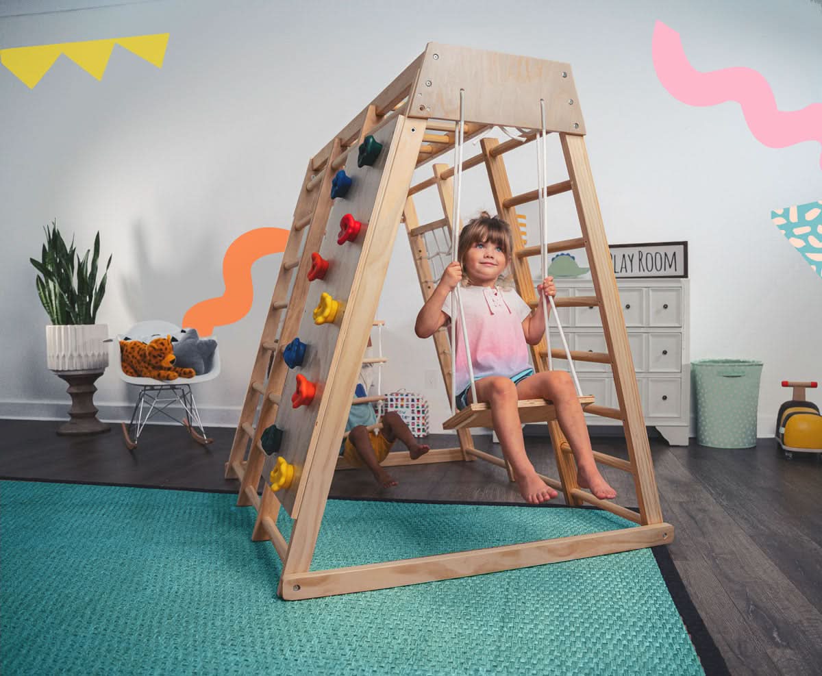 Avenlur Magnolia 7-in-1 Indoor Wooden Playset | Montessori Climbing Gym for Kids | Slide, Monkey Bars, Rope Ladder, Swing & More