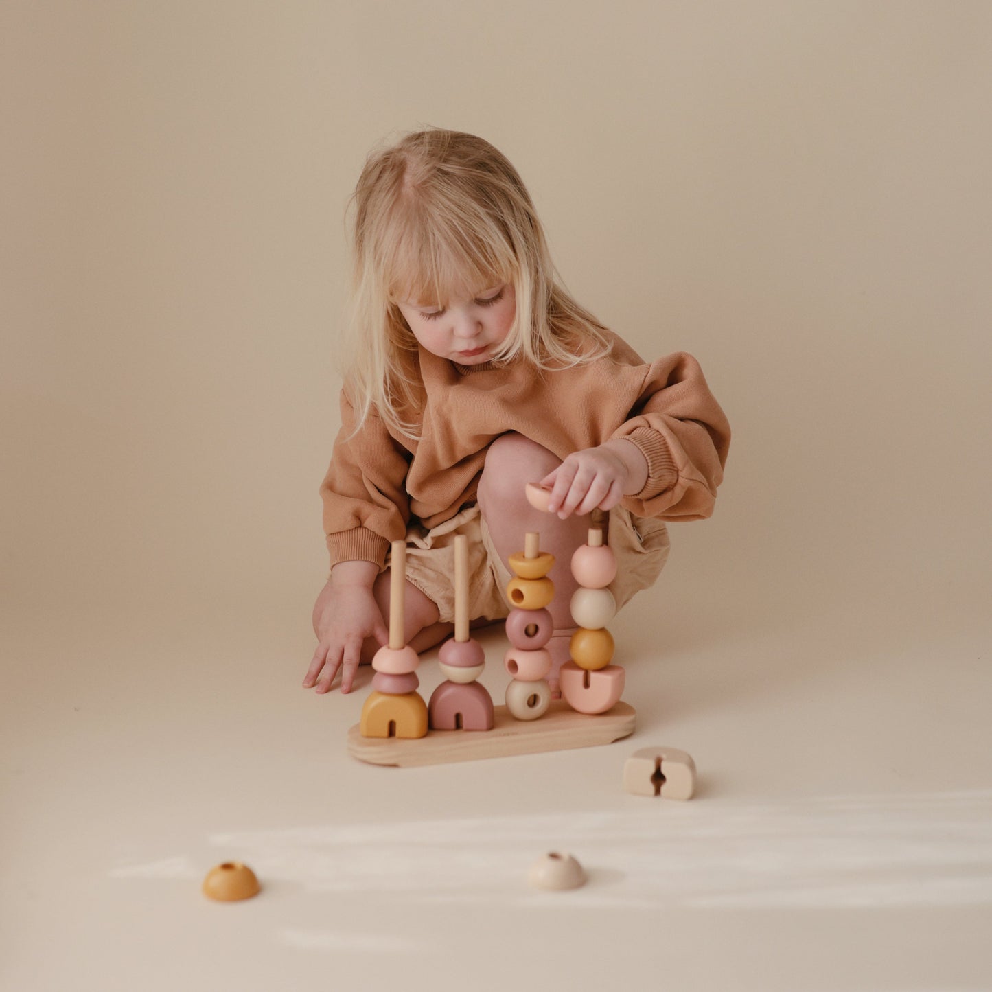 Mushie Wooden Multi Shape Stacker – Educational Sorting & Fine Motor Skills Toy